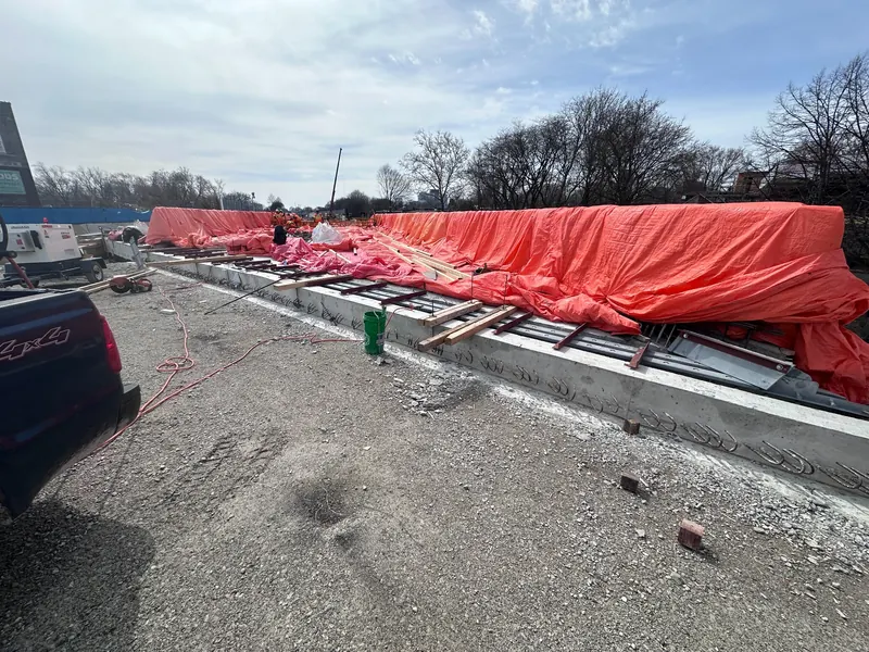 Welded roadway expansion joint during bridge infrastructure construction